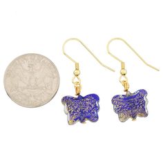 So feminine and unique, these Murano Glass Butterfly Earrings are for a woman who values Venetian elegance and fine Italian style. The earrings feature exquisite butterfly-shaped Murano Glass beads in rich blue color infused with 24K gold leaf sparkles. Gold-plated surgical steel ear hooks offer durability and allergy-free comfort. Our Gorgeous Venetian earrings handcrafted by Murano Glass masters in the ancient glassmaking tradition will magically transport you to the splendor and magical ambia Elegant Blue Butterfly Jewelry, Blue Butterfly Charm Jewelry For Party, Blue Butterfly Charm Dangle Earrings, Blue Butterfly Charm Earrings For Gift, Blue Dangle Earrings With Butterfly Charm, Blue Butterfly Earrings For Gift, Blue Butterfly Earrings As Gift, Blue Butterfly Earrings Gift, Murano Glass Earrings