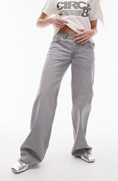 Low-slung nonstretch jeans are cut with puddling cuffs and turned to a dreamy shade of ultralight grey. 30" inseam; 21" leg opening; 10" front rise; 13 1/2" back rise (size 32) Zip fly with button closure Five-pocket style 100% cotton Machine wash, line dry Made in Turkey Washed Mid-rise Gray Bottoms, Mid-rise Washed Gray Bottoms, Gray Washed Mid-rise Bottoms, Gray Jeans With Five Pockets For Spring, Gray Five-pockets Jeans For Spring, Gray Five-pocket Jeans For Spring, Gray Wide Leg Jeans For Fall, Gray Flare Jeans With Five Pockets, Mid-rise Gray Jeans For Fall