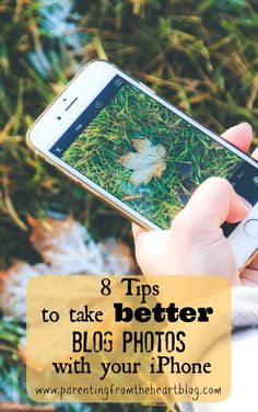 a person holding a cell phone with the text 8 tips to take better photos with your iphone