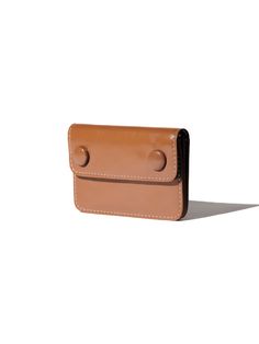 Editor's NoteLE MASQUE's wallet that will instantly adds a touch of liveliness to the look.- Simple and practical design- Snap button closure detail- Good to store cards, bills and coins- Extra card pocket on the back Measurements (in.)- Size: 4.06 in. * 2.76 in. * 0.67 in. Composition & Care- Cow Leather- Natural leather may have fine scratches and wrinkles- Avoid direct heat and moisture- Professional cleaning is neededDesigner- by LE MASQUE Everyday Rectangular Trifold Wallet With Snap Closure, Rectangular Wallets With Magnetic Closure For Everyday, Versatile Rectangular Card Holder With Coin Pocket, Versatile Bifold Card Holder With Coin Pocket, Brown Travel Wallets With Magnetic Closure, Versatile Brown Wallets With Interior Card Slots, Compact Brown Wallet With Card Slots, Everyday Rectangular Card Holder With Snap Closure, Rectangular Card Holder With Snap Closure