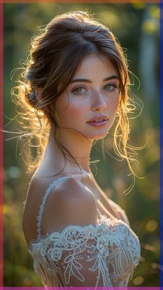 a beautiful young woman in a white dress posing for a photo with the sun shining through her hair