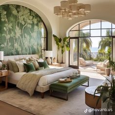 a large bedroom with green wallpaper and palm trees on the walls, along with an arched doorway leading to another room