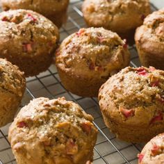 freshly baked muffins cooling on a wire rack, ready to be eaten for consumption