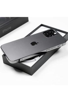 an iphone is sitting in a black box