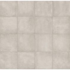 a white tile wall with squares in the middle and one square at the top, as if it were made out of concrete