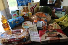 an assortment of food items sitting on a counter