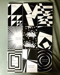 several black and white designs are arranged on a sheet of paper with the words,