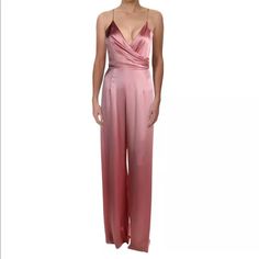 Jill Jill Stuart Womens Satin Wide Leg Drape Jumpsuit Size 2. Wear Your Flair For The Dramatic In This Shiny Satin Jumpsuit Styled With A Surplice Bodice Textured By Folds And Palazzo-Pant Legs To Enliven Your Stride. * 61" Center Front Length; 33" Inseam; 32" Leg Opening * Hidden Back-Zip Closure * Surplice V-Neck * Sleeveless * Spaghetti Straps * On-Seam Pockets * Lined * 76% Triacetate, 24% Polyester Formal Satin V-neck Jumpsuit, Satin V-neck Jumpsuit For Party, Satin Jumpsuit With V-neck For Party, Satin V-neck Jumpsuits And Rompers For Party, Party Satin V-neck Jumpsuits And Rompers, Chic Satin Jumpsuits And Rompers With V-neck, Glamorous Spring Satin Jumpsuit, Glamorous Satin Jumpsuits And Rompers For Spring, Fitted Satin Jumpsuits And Rompers For Spring