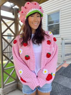 **Strawberry Shortcake-Inspired Pink Cardigan** Indulge in the whimsical charm of our handmade strawberry shortcake-inspired pink cardigan! Crafted with love and care, this unique piece features meticulously hand-sawn strawberries that add a touch of sweetness to your wardrobe. **Key Details - **Size Small to Medium - **Material Soft acrylic yarn - **Design Each strawberry is lovingly crafted by hand, making this cardigan truly one of a kind. Whether you're treating yourself or searching for the perfect gift, our strawberry cardigan embodies both style and integrity. Pair it with our matching strawberry hat (sold separately) for a delightful ensemble that celebrates handmade craftsmanship. 🌸 **Why Choose Our Cardigan?** - 🍓 **Sweetly Unique No two strawberries are alike--just like your s Sweet Pink Cardigan For Fall, Cute Hand Knitted Spring Cardigan, Cute Handmade Spring Cardigan, Handmade Cute Spring Cardigan, Handmade Pink Cardigan For Spring, Cute Crochet Cardigan For Spring, Pink Hand Knitted Cardigan For Spring, Spring Hand Knitted Pink Cardigan, Hand Knitted Pink Cardigan For Spring