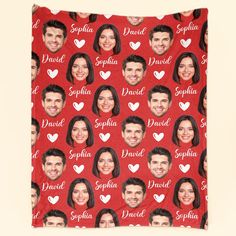 a red blanket with the faces of several people on it and hearts all over them