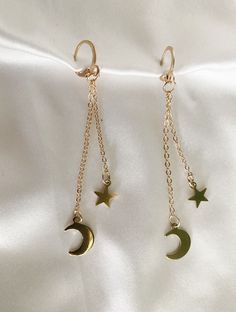 Lightweight and stylish earrings! Trendy Dangle Clip-on Earrings, Gold Dangle Cartilage Earrings For Party, Nickel Free Celestial Earrings, Celestial Style Drop Earrings, Nickel-free Celestial Earrings, Trendy Clip-on Dangle Earrings, Chandbalis Earrings, Celestial Earrings, Stylish Earrings