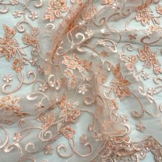 Look no further than Lace USA for the perfect beaded and corded bridal fabric lace for your special event. Our handcrafted, high quality lace material is inlaid with intricate pearls, sequins and beads and is embroidered on 100% polyester net mesh. It's perfect for a wedding dress, evening gown, dance costume or quinceanera dress, and the fabric comes in 5 different color options. Our beaded and corded bridal fabric lace is the best choice for adding a touch of opulence to your special occasion. Elegant Embroidered Organza Lace, Elegant Machine Embroidered Fabric For Festive Occasions, Elegant Lace Fabric With Machine Embroidery, Embroidered Lace Fabric For Mother Of The Bride, Wedding Lace Fabric With 3d Embroidery, Quinceanera Crown, Corded Lace Fabric, For Wedding Dresses, Bridal Lace Fabric