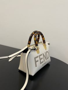 FND By The Way White Mini Bag For Woman 17cm/6.5in Rep 1:1 Size: 17 x 18 x 5 cm / 6.5 x 7 x 2 inch Iconic mini By The Way Boston bag, made of White leather with hot-stamped FND ROMA lettering. Zip fastening. Featuring a lined interior with a pocket and gold-finish metalware. The ... White Mini Bag, Fendi By The Way, Boston Bag, Branded Handbags, Bags Designer Fashion, Exclusive Bag, Luxury Accessories, Fendi Bags, Beautiful Packaging