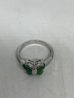 Vintage green nephrite jade Ornate German Silver ring, does not tarnish, NOT sterling Sizes 6.5, 7, or 7.5 All rings are shipped in a nice gift box. Check out our over a THOUSAND great reviews Engraving is $4 per letter and is not always perfect depending on the piece. It can take a few days if the jeweler is busy. This is payable to Paypal Judithsltd@gmail.com Elegant Green Butterfly Ring As Gift, Silver Jade Promise Ring, Silver Jade Rings For Promise, Green Open Ring For Formal Occasions, Green Open Ring For Formal Events, Formal Green Open Ring, Green Emerald Ring With Polished Finish For Anniversary, Anniversary Green Emerald Ring With Polished Finish, Hallmarked Green Emerald Open Ring