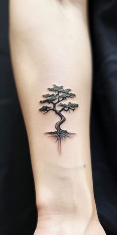 A minimalist, aesthetic bonsai tattoo adorns the wrist, embodying the wearer's respect for nature. Check out our 'TreeTee' Etsy shop, where each tee bought supports our tree-planting mission, fostering a more sustainable world together. Bonsai Tree Tattoo Simple, Small Bonsai Tree Tattoo, Bonsie Trees Tattoo, Tattoo Band Ideas, Bonsai Tattoo Minimalist, Japanese Bonsai Tree Tattoo, Bonsai Tattoo Design, Bonsai Tattoos, Pear Tree Tattoo