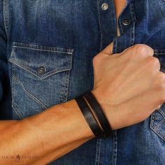 ⛵ Men's Double Layer Leather Bracelet - Adjustable Length 🌵 AUSTRALIAN SURFER STYLE WRISTBAND - OUTBACK ESCAPES 🌊 Masculine stylish look, Perfect in its simplicity 🌴 Hand made bracelet with beautiful burnished edges; 100% Genuine Leather 🌍 Embrace your Adventures with our Original and Long-lasting Casual Jewelry ➯ Black color   (for the Dark Brown version - please see another offer at our store) The length can be easily adjusted to best fit your needs - series of small adjustment holes; tota Classic Black Bracelets With Wrist Strap, Classic Black Bracelet With Wrist Strap, Black Wristband For Father's Day, Black Everyday Wristband For Father's Day, Casual Black Band Wristband, Classic Black Wristband For Everyday, Masculine Black Bracelets For Everyday, Black Leather Strap Wristband As Gift, Masculine Black Everyday Bracelets