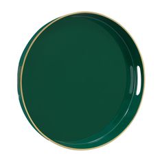 a green and gold plate on a white background