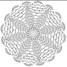 an intricate circular design in black and white