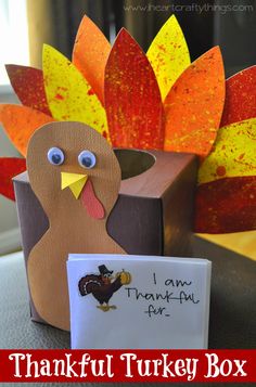 an image of a thanksgiving card holder made out of paper and cardboard with a turkey on it