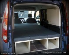 the back end of a van with its cargo compartment open