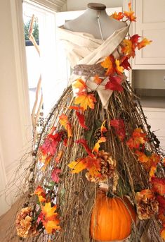 a dress made out of hay and leaves