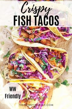 three fish tacos with cabbage slaw and cilantro