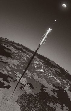 a black and white photo of an object flying in the sky over water with moon behind it