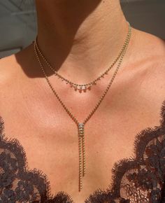 A little bit sexy and totally cool, the Gemini Bolo is a new take on the classic style. Our signature ball chain is designed with a dueling silhouette that delicately holds a graduating row of diamonds that feels like they're almost floating. The epitome of versatility, the Gemini Bolo is the necklace that can be easily dressed up or down. 14k Yellow Gold Diamond: 0.27 total carat weight Stones: natural white diamonds Length: 19 inch chain with a 3 inch drop Puffy Heart Necklace, Floating Necklace, Puffy Heart, Evil Eye Necklace, Handmade Gold, Butterfly Necklace, Eye Necklace, White Diamonds, Ball Chain