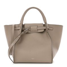 This is an authentic CELINE Supple Grained Calfskin Small Big Bag in Light Taupe. This chic structured tote is crafted of finely grained calfskin leather in beige. This shoulder bag features tall rolled leather top handles, a leather shoulder strap and silver hardware. The top opens to a suede interior with a hanging zipper pocket. Business Bags In Taupe With Palladium Hardware, Luxury Grained Texture Top Handle Shoulder Bag, Chic Top Handle Bag With Grained Texture, Taupe Business Bags With Palladium Hardware, Luxury Taupe Textured Leather Bag, Chic Shoulder Bag With Grained Texture And Top Handle, Elegant Leather Bags With Grained Texture, Chic Top Handle Shoulder Bag With Grained Texture, Elegant Grained Texture Tote Shoulder Bag