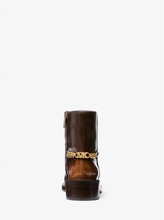 Carlisle Burnished Leather Boot | Michael Kors Luxury Brown Moto Boots For Fall, Brown Patent Leather Work Boots, Brown Patent Leather Boots Medium Width, Luggage Sizes, Leather Boot, Equestrian Style, Carlisle, Heel Type, Cropped Denim