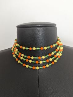 A 1960s colorful and multiple strand necklace is perfect for any occasion. It is in mint vintage condition. This is an adjustable, so you can wear it high or low on the neck. Or, layer it up with a chain necklace for another look. It was found at a flea market in Aspen. What a terrific gift idea. Cheap Retro Beaded Necklaces, Short Beaded Necklace, Colorful Choker, Clutch Purse Black, Multi Strand Beaded Necklace, Round Dangle Earrings, Silver Bead Necklace, Beaded Collar, Hippie Necklace