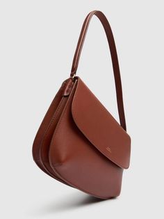 Height: 18cm Width: 23.5cm. Strap drop: 22cm. Adjustable strap can be worn on the shoulder or across the chest. Front flap with snap button closure Timeless Cognac Shoulder Bag With Detachable Strap, Evening Saddle Satchel Bag With Adjustable Strap, Evening Saddle Shoulder Bag With Adjustable Strap, Classic Top Handle Shoulder Bag With Leather Lining, Classic Shoulder Bag With Leather Lining And Top Handle, Classic Flap Bag With Detachable Strap For Daily Use, Formal Satchel Saddle Bag With Detachable Handle, Timeless Flap Shoulder Bag For Everyday Use, Classic Crossbody Shoulder Bag With Removable Pouch