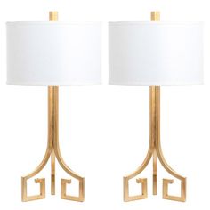 pair of gold metal table lamps with white shades