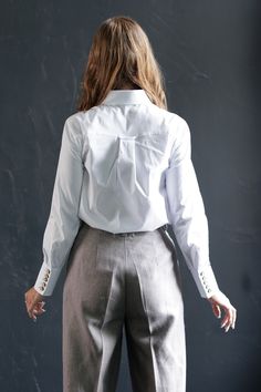 White Long Sleeve Shirt With Covered Buttons, Elegant Linen Shirt With Button Cuffs, Cotton Long Sleeve Blouse With Covered Buttons, Long Sleeve Linen Office Tops, Long Sleeve Linen Tops For Office, Fitted Linen Blouse With Button Cuffs, Elegant White Tops With Roll-up Sleeves, Elegant White Top With Roll-up Sleeves, White Blouse With Cuffed Sleeves For Fall