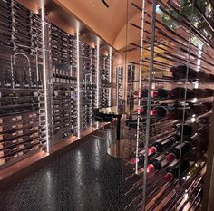 a wine cellar filled with lots of bottles