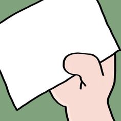 a person holding up a piece of paper in front of their face with one hand