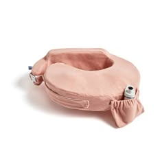 an image of a pink travel pillow on white background