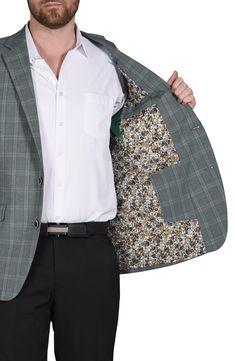 A rich plaid print distinguishes this woven sport coat that'll make a dapper statement to top off any look. Two-button closure Notched lapels Chest welt pocket; front flap welt pockets 70% polyester, 28% rayon, 2% spandex Dry clean Imported Savile Row, Notch Collar, Sports Blazer, Short Suit, Jogger Jeans, Suit Shop, Jogger Sweatpants, Casual Streetwear, Plaid Print