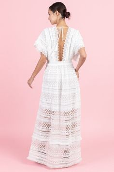 "Deep V-Neck Maxi Lace Dress with Accentuated Waist Color: White Material: 100% Poly Length: 50\" armpit down Waist: Small 28\", Medium 30\", Large 32\" Model wearing S and is 5'7\" tall ALL SALES ARE FINAL." Bohemian V-neck Dress With Crochet Trim, V-neck Vacation Dress With Lace Sleeves, Scalloped Lace V-neck Dress For Brunch, Delicate Lace V-neck Dress For Brunch, V-neck Maxi Dress With Lace Patchwork For Beach, Bohemian V-neck Maxi Dress With Lace Patchwork, V-neck Lace Patchwork Maxi Dress For Beach, White Bohemian Maxi Dress With Lace Patchwork, Bohemian White Maxi Dress With Lace Patchwork