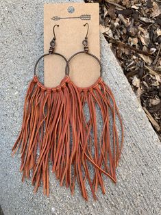 Bohemian Brown Beaded Tassel Earrings, Adjustable Brown Bohemian Tassel Earrings, Bohemian Adjustable Tassel Earrings With Fringe, Adjustable Bohemian Tassel Earrings With Fringe, Bohemian Brown Fringe Earrings, Brown Fringe Tassel Dangle Earrings, Brown Fringe Dangle Tassel Earrings, Brown Fringe Tassel Earrings For Festivals, Brown Dangle Tassel Earrings With Fringe