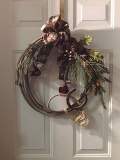 a wreath is hanging on the front door