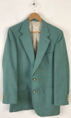 "-Description- >men's green sport coat with gold buttons >two button front >three buttons on the cuffs >two flap close and one open pocket on the front >vent in the back >partially lined >size 40 >perfect for a holiday party! >condition: great >color(s): green, gold >fabric(s): wool >brand: pbm >care: dry clean -Measurements- >size: 40 ✩ all measurements are taken with the item laying flat & some sizes are estimates so please check measurements ✩ che Classic Green Sport Coat With Button Closure, Classic Green Blazer With Button Cuffs, Formal Green Sport Coat With Button Closure, Green Sport Coat With Button Closure For Formal Occasions, Vintage Green Long Sleeve Sport Coat, Vintage Tailored Green Blazer, Classic Green Blazer With Buttons, Vintage Green Single Breasted Sport Coat, Vintage Green Outerwear For Formal Occasions