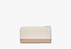 Reach for our Devin continental wallet on repeat. It’s made from scratch-resistant Saffiano leather so it’ll last for years to come. | Kate Spade Devin Colorblocked Zip Around Continental Wallet, Timeless Taupe Kate Spade Beige Wallet For Everyday Use, Kate Spade Brown Everyday Wallet, Luxury Leather Wallet By Kate Spade, Kate Spade Brown Rectangular Wallets, Kate Spade Beige Wallet, Kate Spade Wallet, On Repeat, Summer Essentials, Continental Wallet