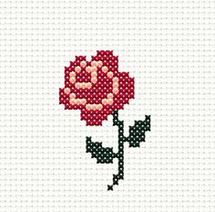 a cross stitch rose on a white background