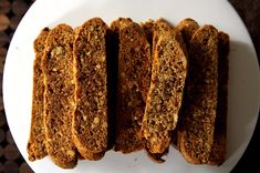 four pieces of bread on a white plate