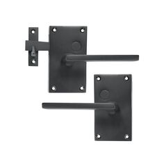 two black door handles on a white background