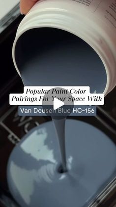 a person is pouring blue paint onto a black surface with the words popular paint color paintings for your space with van deuse, blue hc - 156