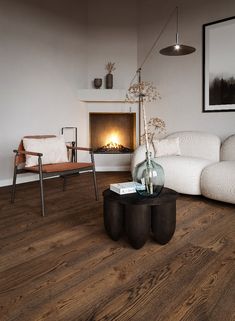 The Twelve Hardwood parquet flooring Dark Wooden Floor Interior, Dark Wood Floor Interior Design Living Room, Dark Floors Apartment, Wood Floor Black Furniture, Dark Wood Floor Interior, Dark Brown Flooring Living Room, Bedroom Ideas Dark Floor, Dark Laminate Flooring Bedroom, Dark Floor Apartment