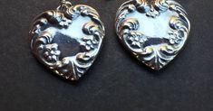 "These are a very sweet pair of sterling silver flowered and scroll embossed heart earrings.   Same on both sides.   Very well crafted. They are marked \"Sterling\".         2.4 grams each.      1 1/4\" long from top of ear wire X 3/4\" wide.  Great for the love of in your life!" Ornate Engraved Sterling Silver Earrings, Victorian Engraved Earrings For Gifts, Victorian Silver Jewelry For Valentine's Day, Mother's Day Silver Nickel-free Heart Earrings, Mother's Day Nickel-free Silver Heart Earrings, Mother's Day Nickel Free Silver Heart Earrings, Mother's Day Silver Heart Earrings Nickel Free, Vintage Double Heart Earrings For Anniversary, Vintage Silver Nickel-free Heart Earrings