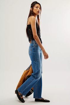 Levi's Ribcage Full-Length Jeans | Free People Summer Classic Flare Jeans With Straight Hem, Fitted Classic Flare Jeans With Frayed Hem, Retro Bottoms With Straight Hem For Spring, Vintage Bottoms With Straight Hem For Fall, Retro Spring Bottoms With Straight Hem, Vintage Fitted Jeans With Straight Hem, Fitted Vintage Jeans With Straight Hem, Vintage Straight Leg Flare Jeans For Spring, Vintage Spring Flare Jeans